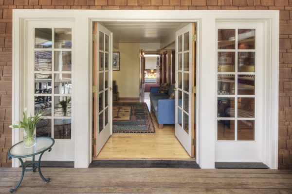 Glass doors on wooden patio